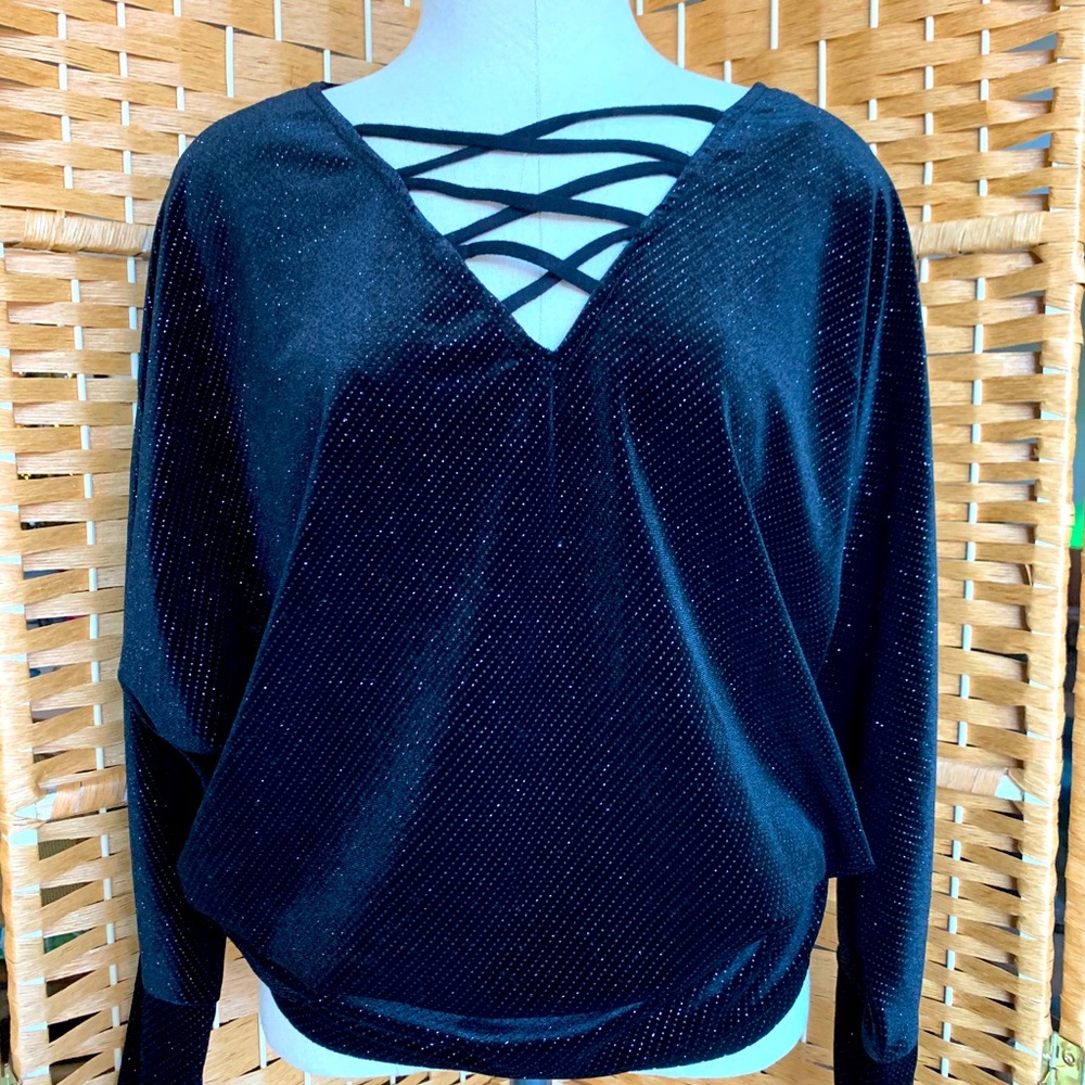 Jennifer Lopez black blouse